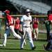 Saline first baseman AJ Korzuck walks back toward the dugout after a walk off hit in the seventh inning of the game against Bedford on Monday, June 3. Daniel Brenner I AnnArbor.com